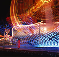 Carnival rides light up the Puyallup Fair at night