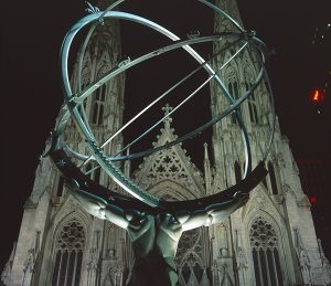 The Atlas of Rockefeller Center faces off against St. Patricks Cathedral